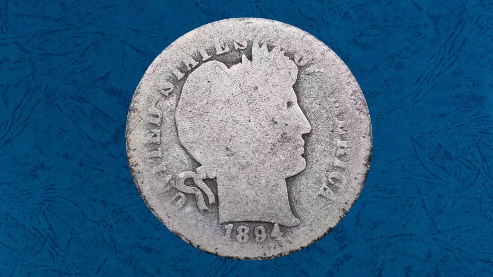 1894 Barber dime lamination error showing metal peeling from planchet surface